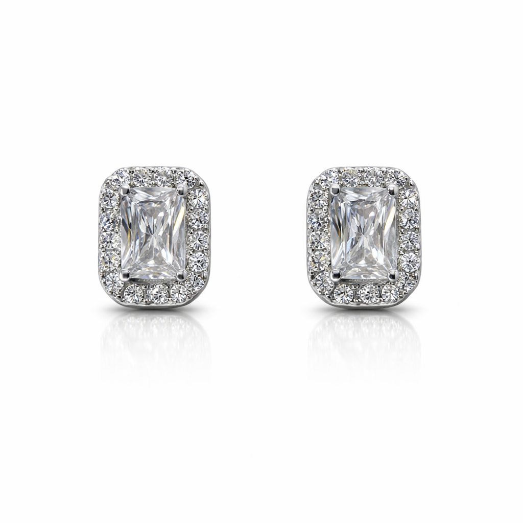 Pair of diamond earrings on a white background