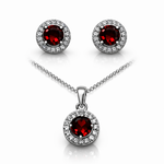 Load image into Gallery viewer, Jewelry set with round red gemstones and silver accents on a white background