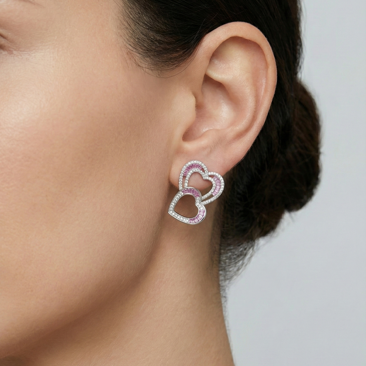 Eterna heart serti earrings