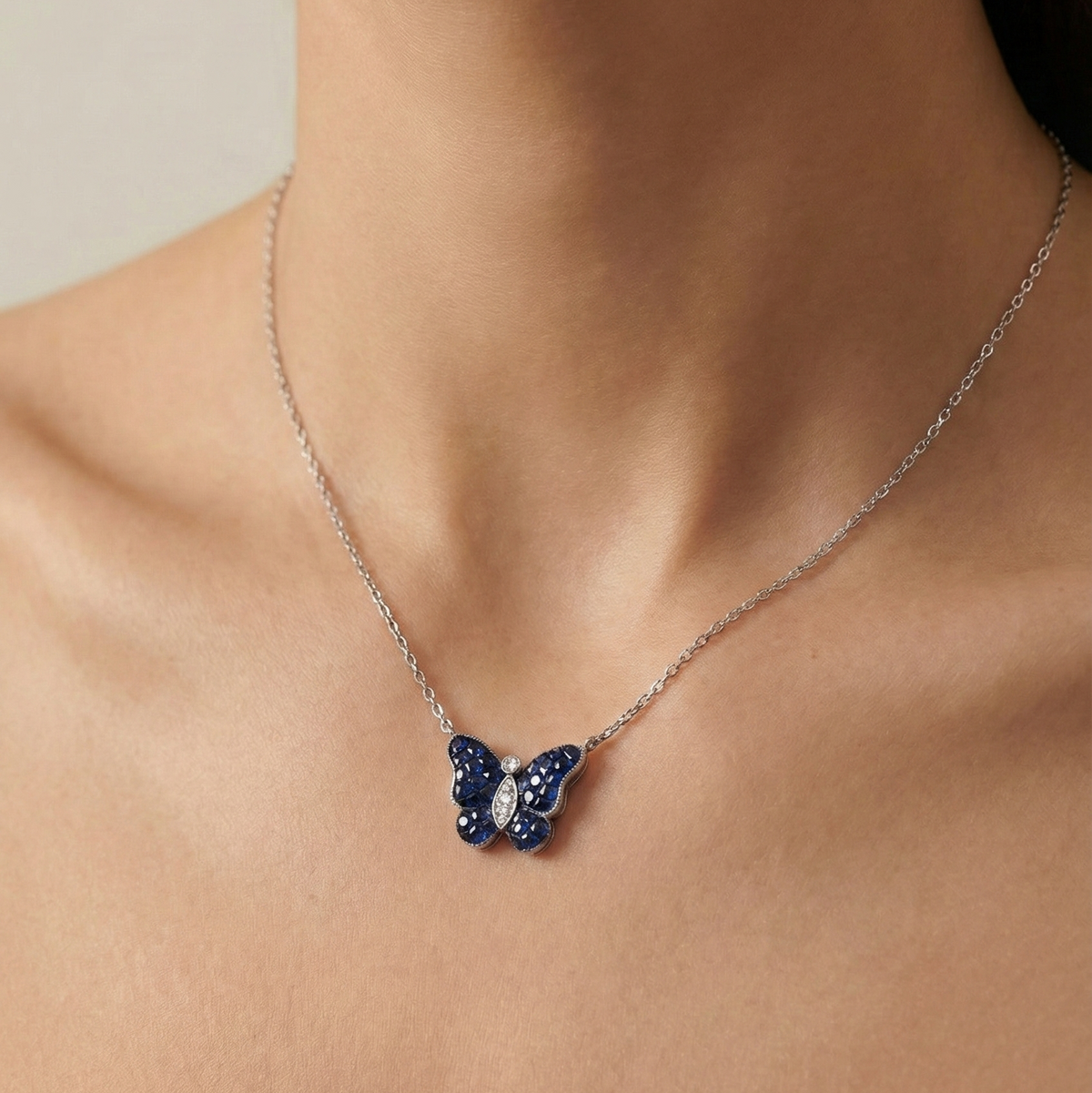 Serti blue butterfly pendant