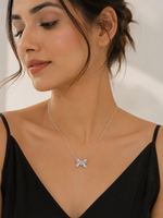 Load image into Gallery viewer, Serti Lumière Bow Pendant
