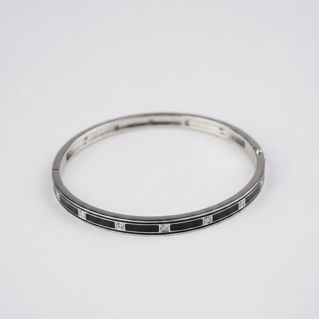 Silver Bracelet with black and white pattern on a white background